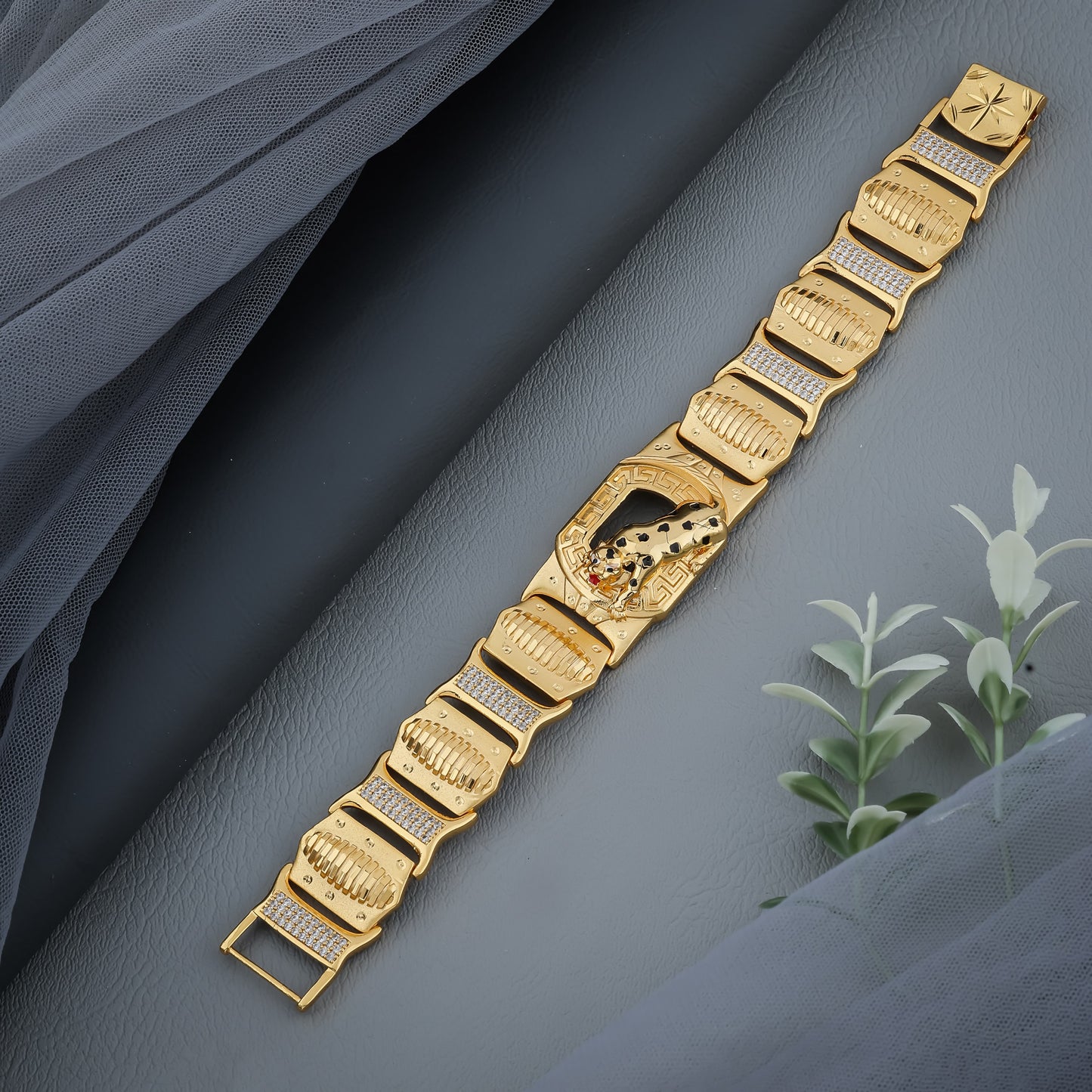 Wild Elegance: Gold-Toned Panther Medallion Bracelet with Greca Border