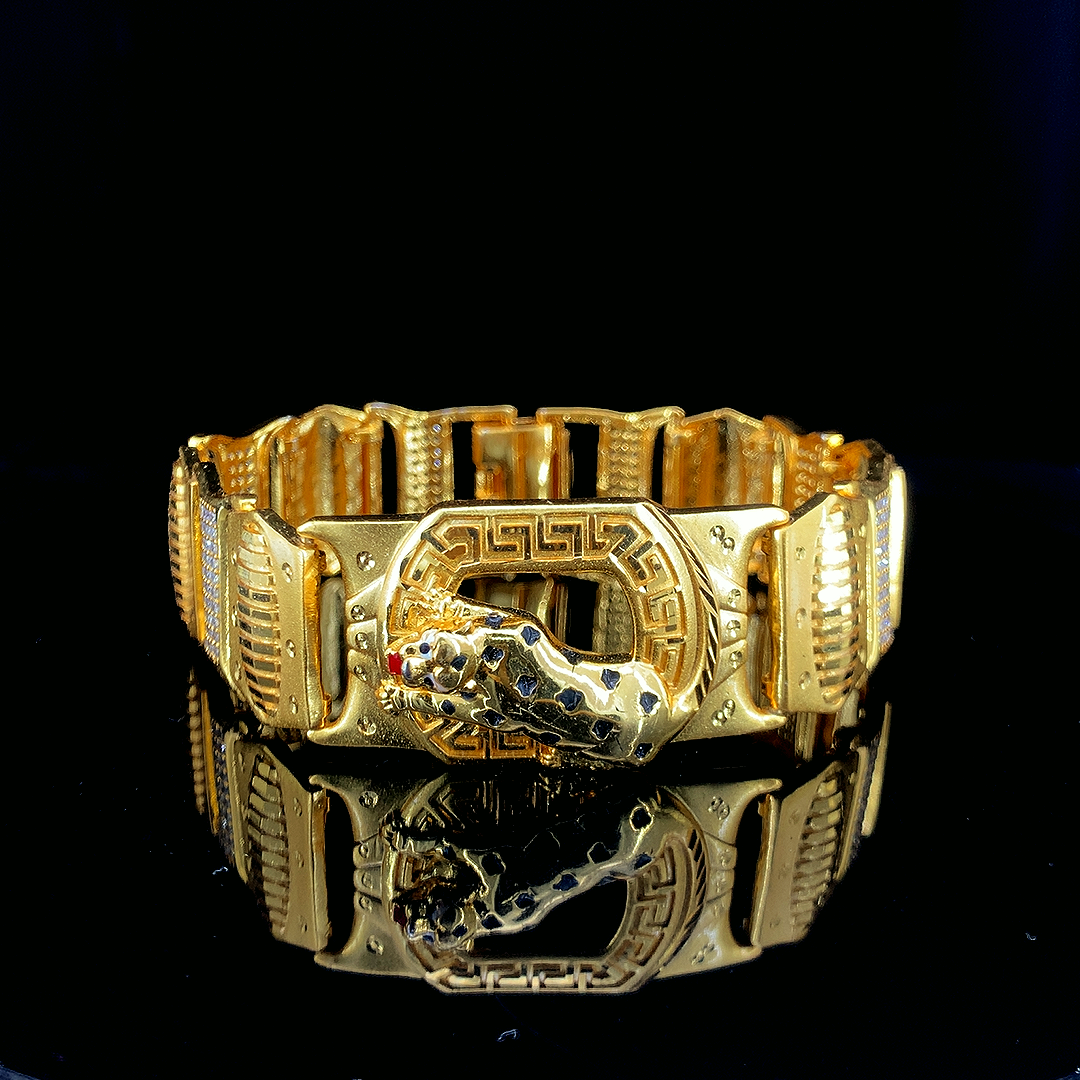 Wild Elegance: Gold-Toned Panther Medallion Bracelet with Greca Border