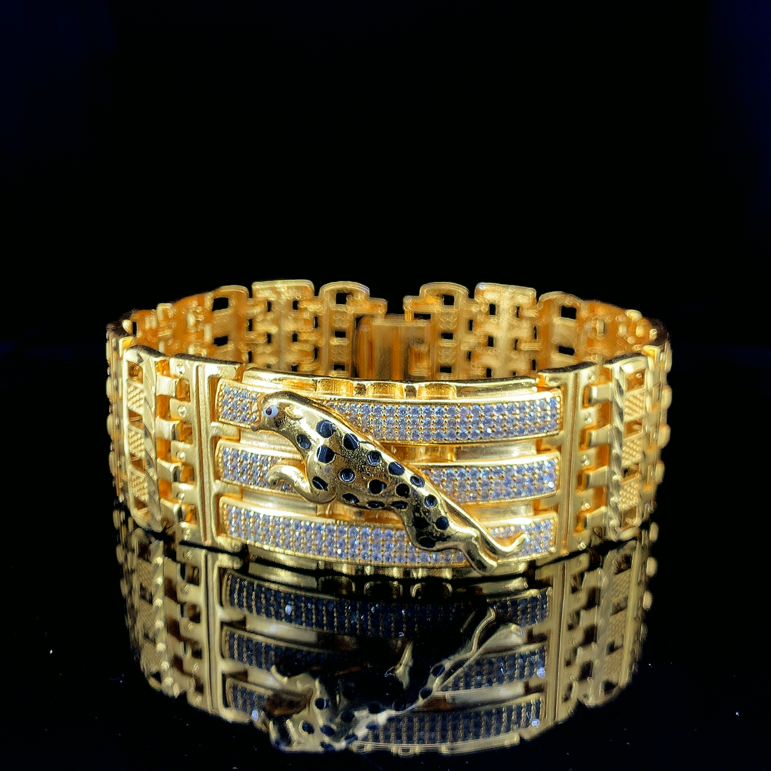 Luxurious Crystal-Striped Gold Bracelet with Black Enamel Jaguar
