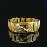 Wild Elegance: Gold-Toned Panther Medallion Bracelet with Greca Border