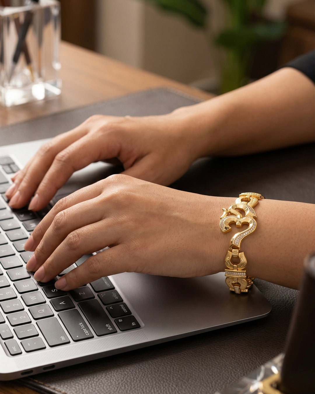 Alternative: Elegant Iced-Out Om Symbol Bracelet with Horseshoe-Style Links