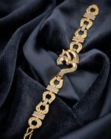 Alternative: Elegant Iced-Out Om Symbol Bracelet with Horseshoe-Style Links